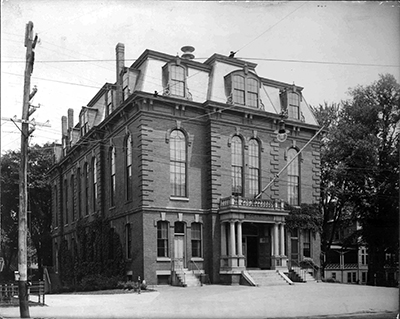 Exterior of Old Town Hall 1871. Part of the Edwin B. Worthen Collection at Cary Library Exterior of Old Town Hall 1871