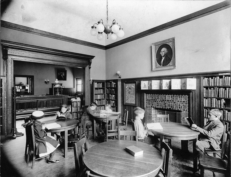 Children reading in library