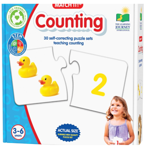 White box cover featuring one puzzle piece with two yellow ducks next to another puzzle piece with a yellow number 2 on it.