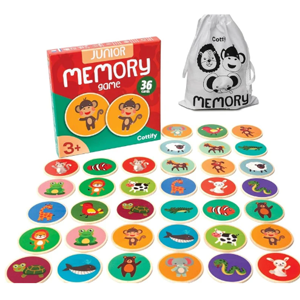Round discs with objects on them displayed next to cloth bag and game box