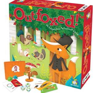 Colorful game box with fox on it and cards, dice and pieces in front.