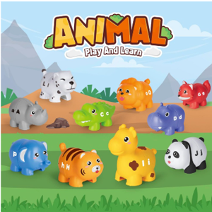 Colorful plastic animals on a painted outdoor nature scene with mountains