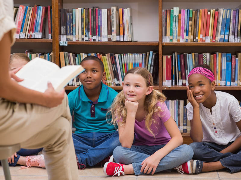 Children listening to a story being read